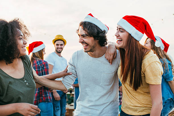 istock Friends on a Christmas celebration 614508710