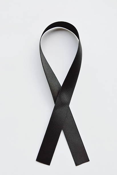 istock mourning ribbon on white background 614509260