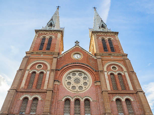 istock Notre Dame Cathedral over blue sky at Ho Chi Minh 614509696
