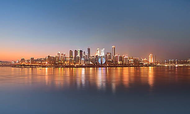 istock Skyscrapers reflecting in the river 614510056