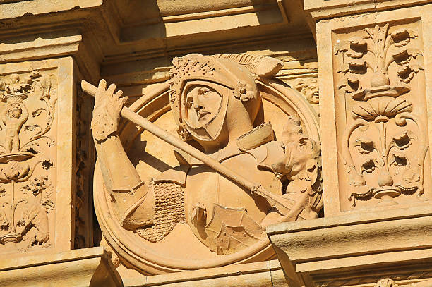 Salamanca, Spain - August 3, 2016: Bas relief of a medieval Knight in armor, on the facade of the Convento de San Esteban, a Dominican monastery in Salamanca, Spain.