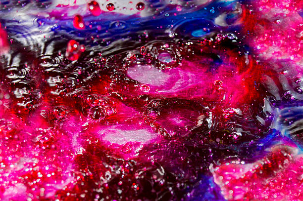 istock Abstract a small drop of water,full red with blue 614512082