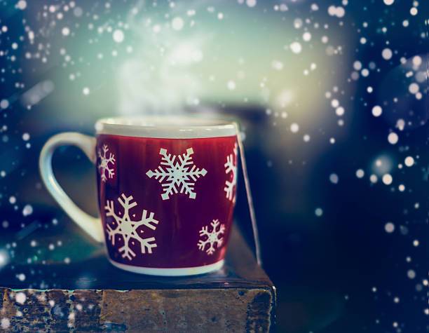 istock Winter snowflakes cup with hot tea 614512300