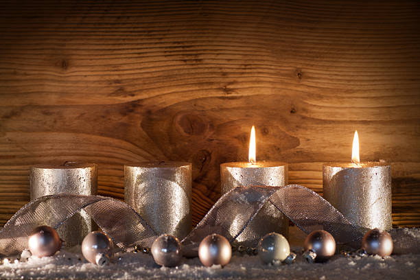 Silver candles for the 2. Advent Still life with silver candles for the 2. advent in front of a wooden wall stars in your eyes stock pictures, royalty-free photos & images