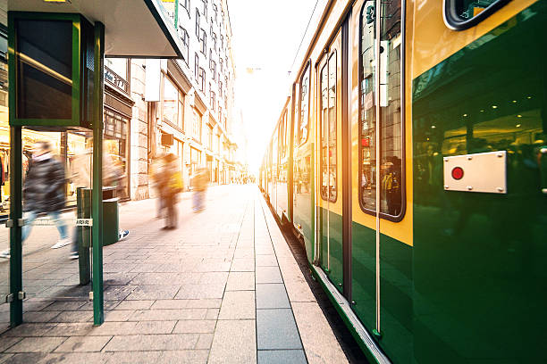 Tram on the street Tram on the street blurred motion street car green stock pictures, royalty-free photos & images