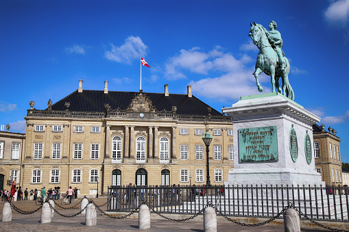 Copenhagen, Denmark - August 15, 2016: Sculpture of Frederik V on Horseback in Amalienborg Square, it's home of the Danish Royal family in Copenhagen, Denmark