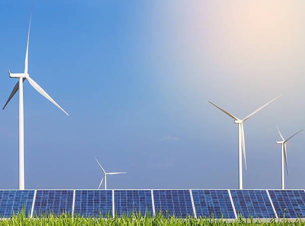 istock solar photovoltaics  panel and wind turbines generating electricity 614518246