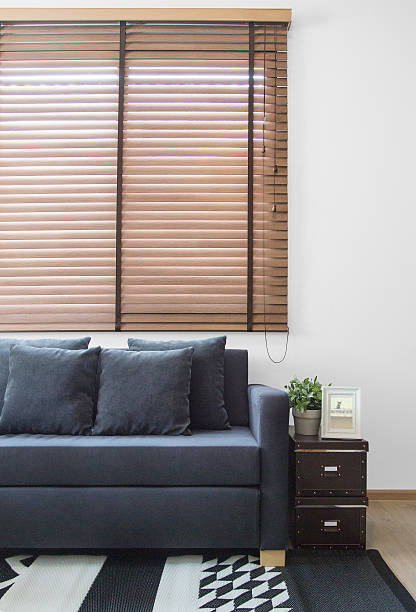 istock Living room, navy blue sofa with boxes in loft style. 614518350