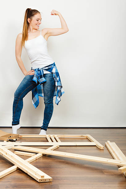 istock Woman moving into new apartment. Success. 614518406