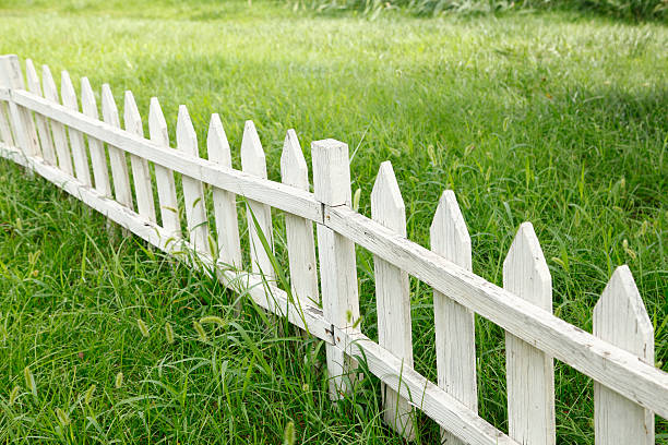 istock The lawn wooden fence 614524864