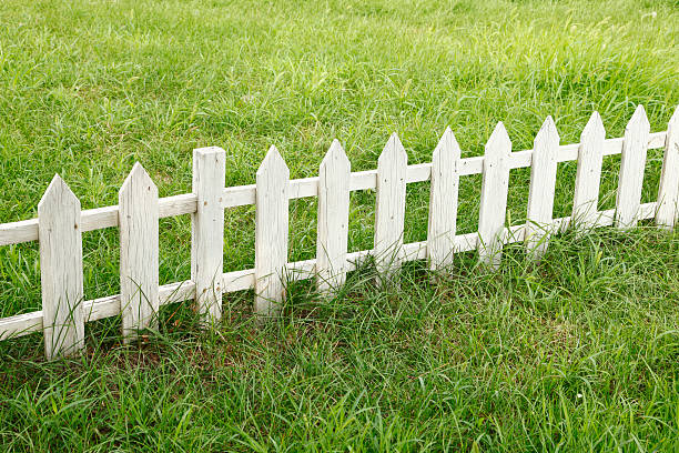istock The lawn wooden fence 614524972