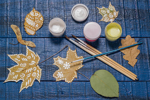 istock Hand-painted on dry autumn leaves 614525186