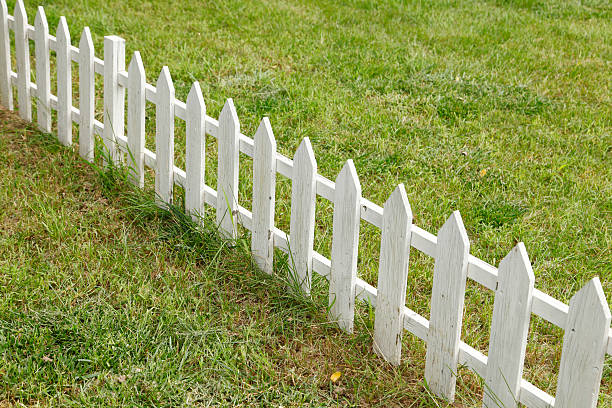 istock The lawn wooden fence 614525478