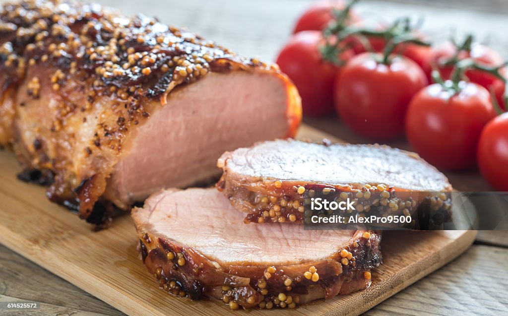 Baked pork meat wrapped in bacon Pork Stock Photo