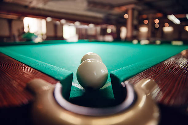 istock Billiard balls near pocket 614526902