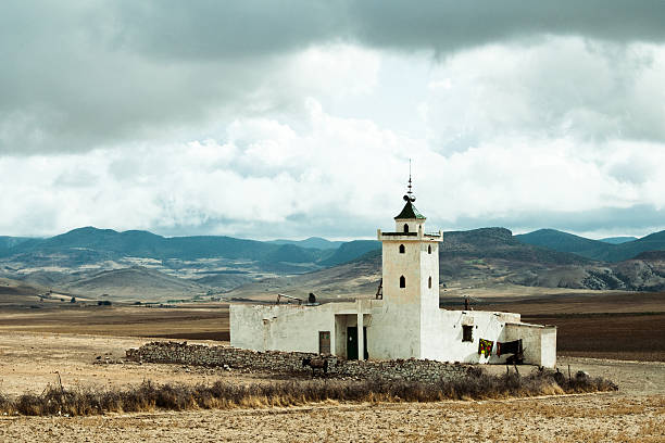 Local roadside mosque near Mrirt, Khenifra province, Morocco Local mosque near Mrirt on the background of Middle Atlas mountains, Khenifra province, Morocco khenifra stock pictures, royalty-free photos & images