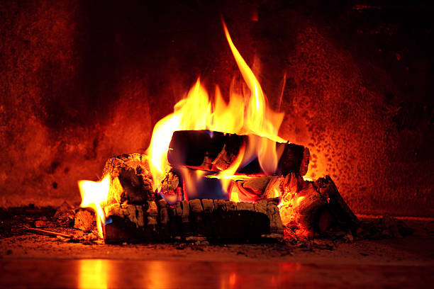 Flame in fireplace. stock photo