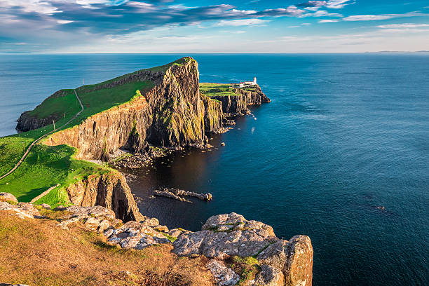 istock Beautiful sunset at the Neist point lighthouse, Scotland 614528536