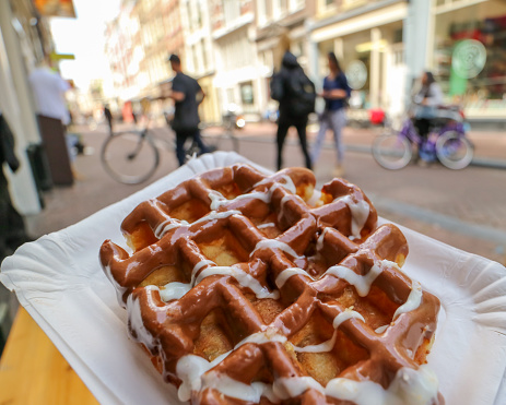 Belgian waffle with chocolate and vanilla icing