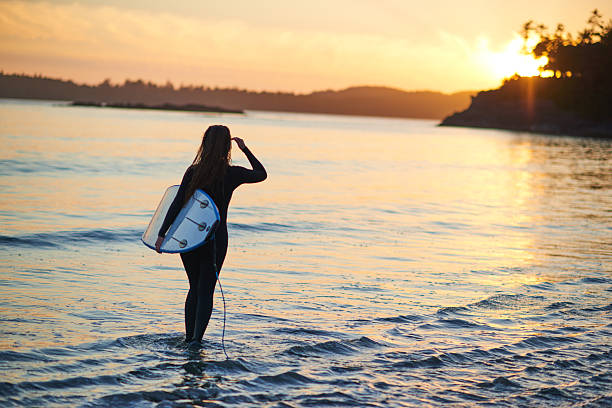 istock Surfing for strong girls 614532300