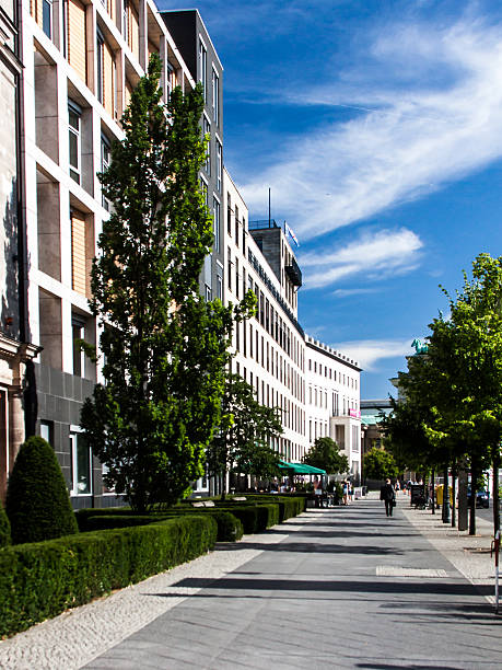 istock Office building and wide pavement. Street in Berlin, Germany 614534030