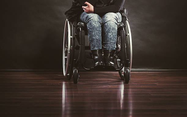 istock Legs of disabled person. 614534598