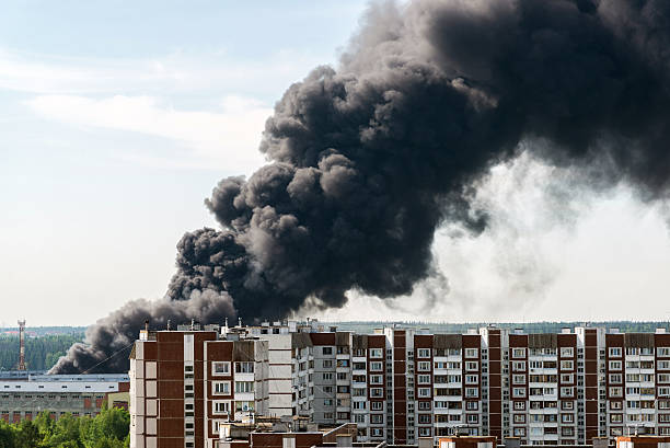 istock Black smoke from a major fire in Moscow, Russia 614536656