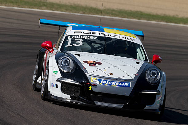 Imola, Italy - September 25, 2016: A Porsche 911 Gt3 Cup of Tsunami Rt team, driven By Gaidai Oleksandr and LEDOGAR Come,  the Porsche Carrera Cup Italia car racing on September 25, 2016 in Imola, Italy.