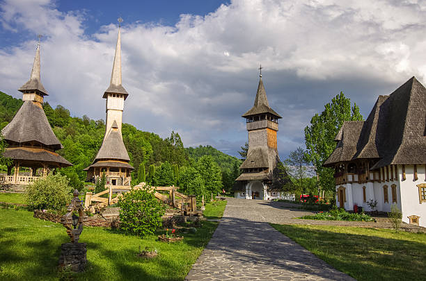 Wooden church of Barsana monastery. Maramures region, Romania Wooden church of Barsana monastery. Maramures region, Romania maramureș stock pictures, royalty-free photos & images