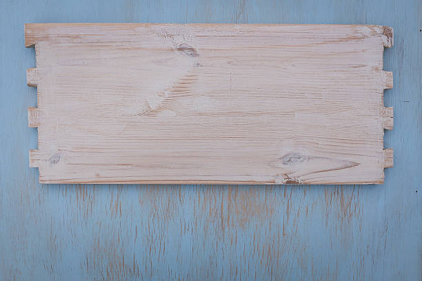 istock worn board on plywood. 614604382