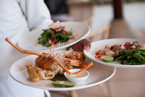 istock Waiter serving delicious food 614606016
