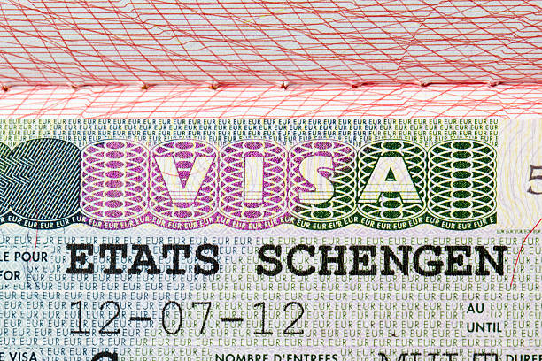 istock Schengen visa stamp oin passport 614608846