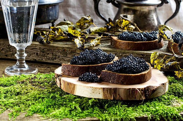 istock Black caviar and vodka. Vintage style. 614610042