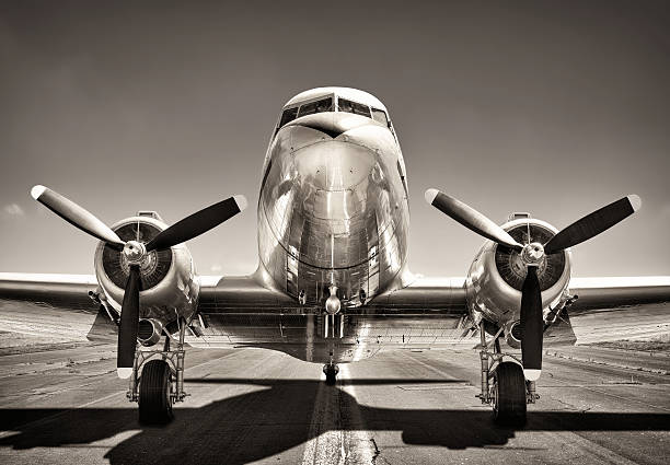 vintage airplane airplane on a runway propeller stock pictures, royalty-free photos & images