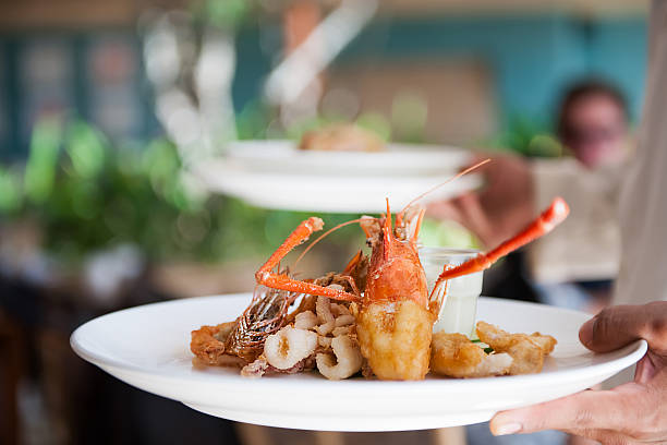 Pasta with seafood in a beautiful plate. Beautiful seafood dish.
