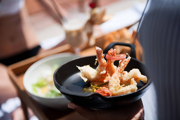 istock Waiter serving delicious food 614611608