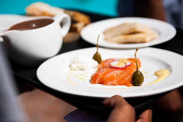 istock Waiter serving delicious food 614611874