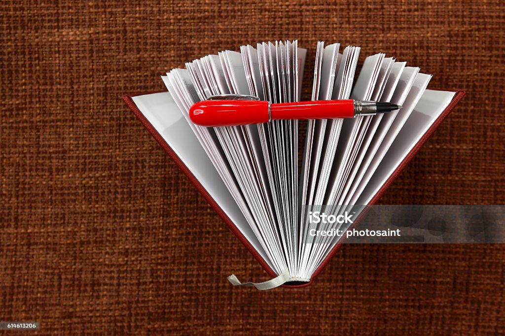 Open Notepad Book Open Notepad And Red Pen Closeup Stock Photo - Download Image Now ...