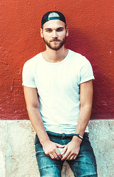 istock Serious young man on the street 614615668