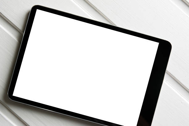 istock generic tablet pc on top of wooden table 614616194