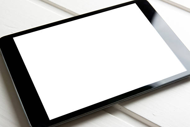 istock generic tablet pc on top of wooden table 614616204
