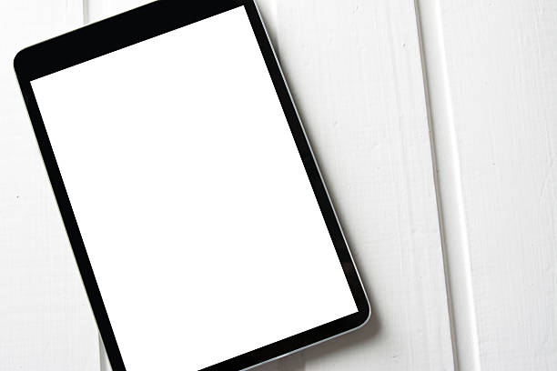 istock generic tablet pc on top of wooden table 614616220