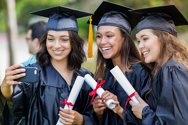 College friends take selfie after graduation