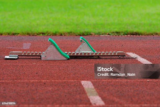 Athletics Starting Blocks On A Red Running Track Stock Photo - Download Image Now - Achievement, Activity, Agricultural Field