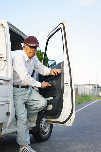 istock Japanese old person doing agricultural work in rural area 614618882