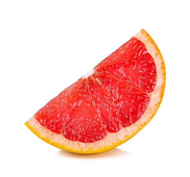 istock Slice of Grapefruit isolated on the white background 614620496