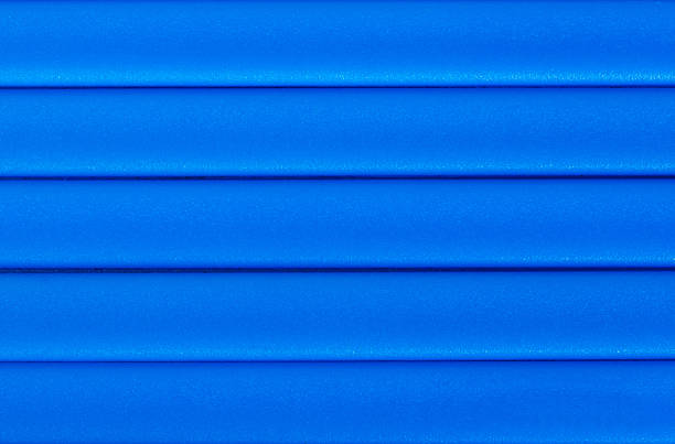 istock Texture of plastic panels, blue siding, house wall, plastic texture 614622180