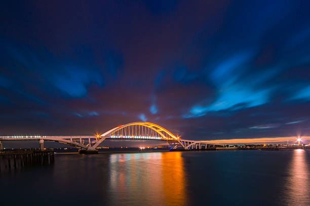 istock Xiamen wuyuan bridge with lighting at dawn 614624068
