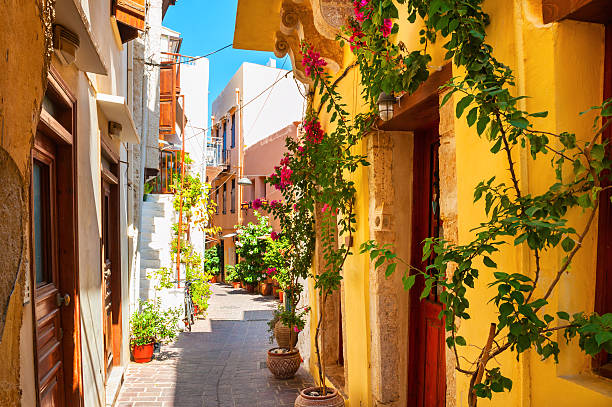 Beautiful street in Chania, Crete island, Greece. Beautiful street with colorful buildings in Chania, Crete island, Greece. Summer landscape crete photos stock pictures, royalty-free photos & images