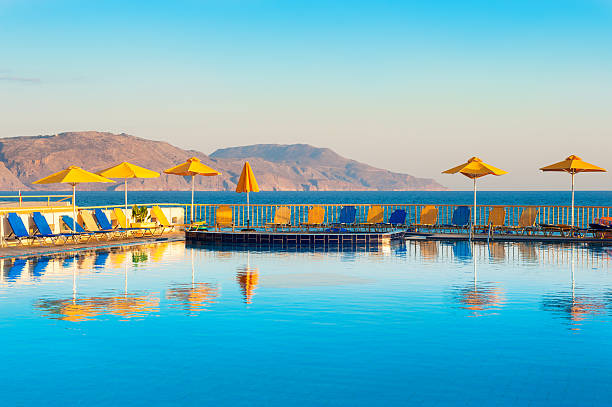 istock Swimming pool on the sea coast 614626306